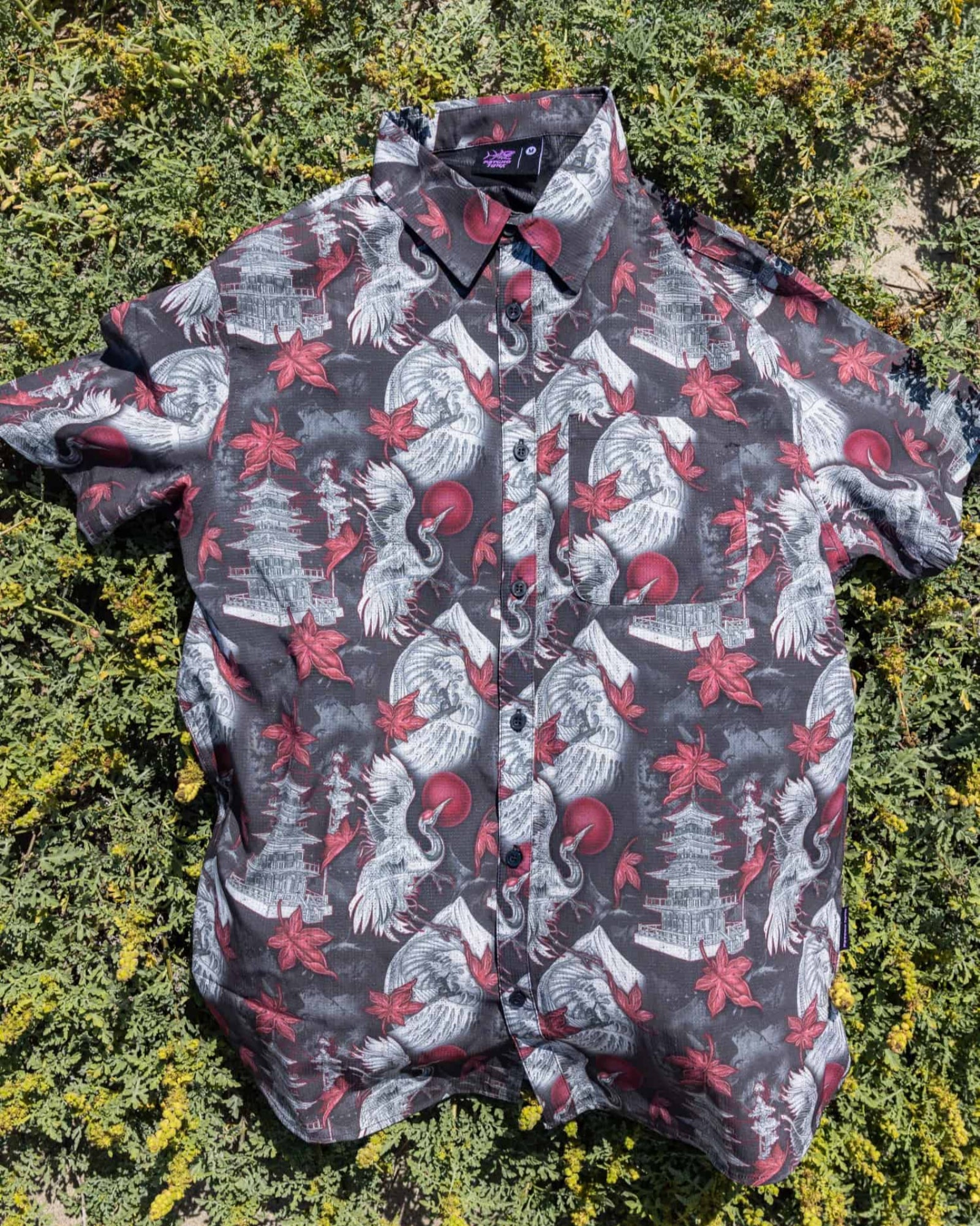 Moonless Night colored Men’s Sky Crane Shirt with 4-Way Technical Woven Fabric on grass background