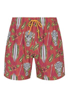 Psycho Tuna’s Men’s Maori Printed Pool Shorts in Tibetan Red, showcasing intricate Maori-inspired designs